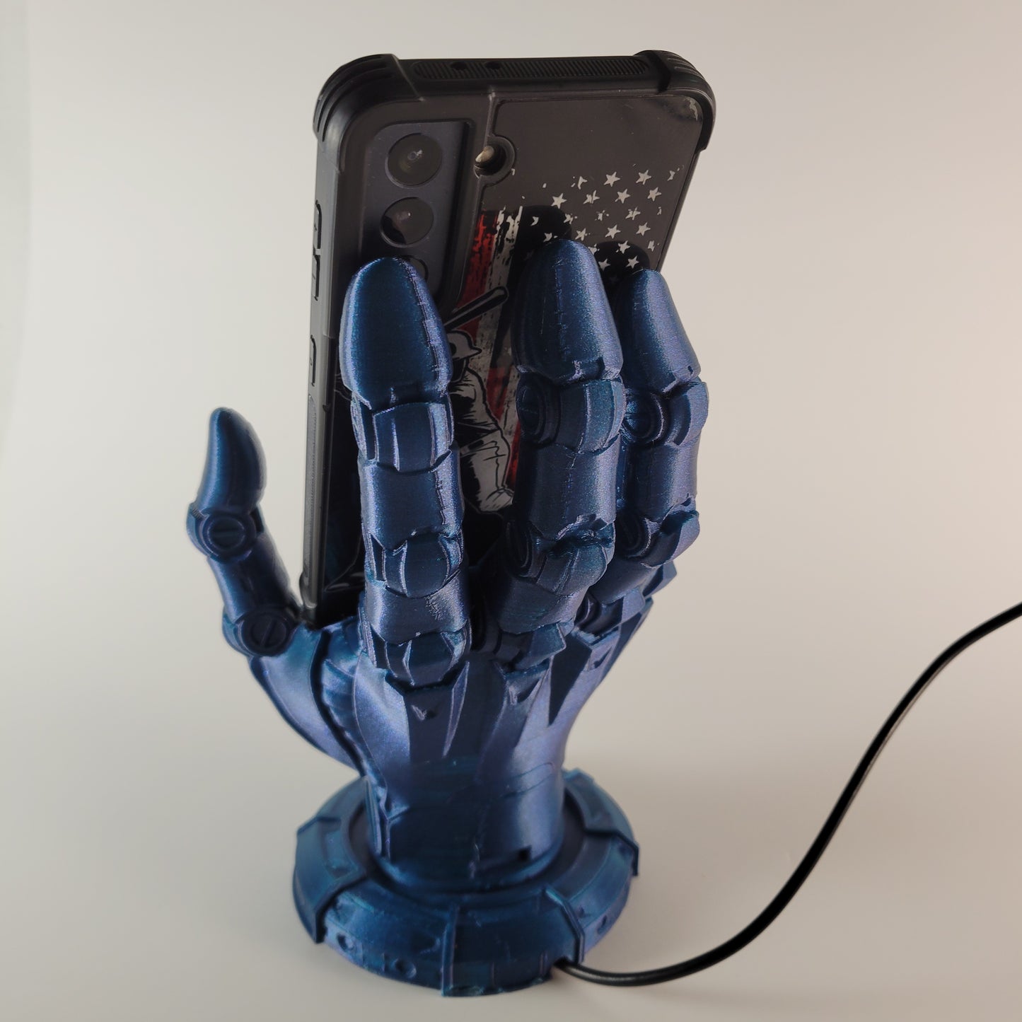 Robot Hand Phone Holder with Hidden Charging port.